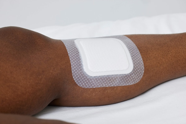 Biatain Silicone Fit 5 x 5” dressing applied to skin. 